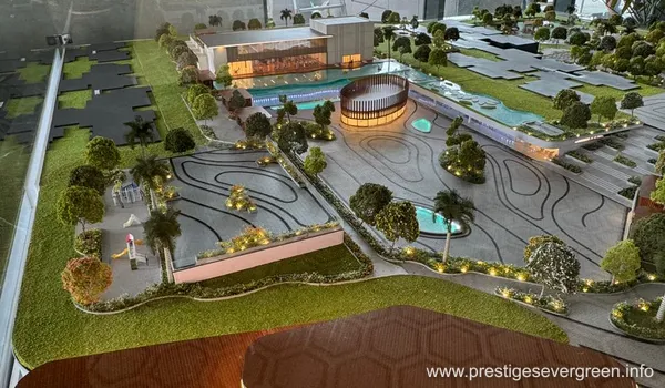 Architectural scale model of Prestige Evergreen Whitefield featuring a luxury clubhouse, swimming pool, and landscaped gardens.