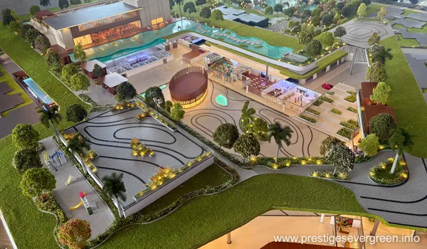 Architectural scale model of Prestige Evergreen residential project showing the clubhouse, luxury swimming pool, and landscaped green areas
