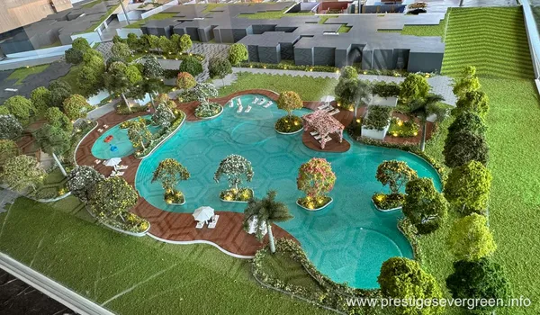 Scale model of Prestige Evergreen Varthur Bangalore showcasing the luxury lagoon swimming pool, tropical landscaping, and clubhouse amenities